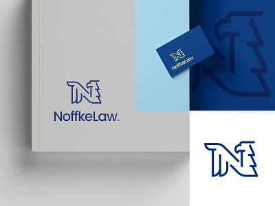 Noffke Law animal attorney beak bird blue book care eagle justice law logo monogram safe safety wing