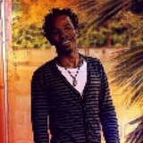 sןɹɐɥɔ Isabirye