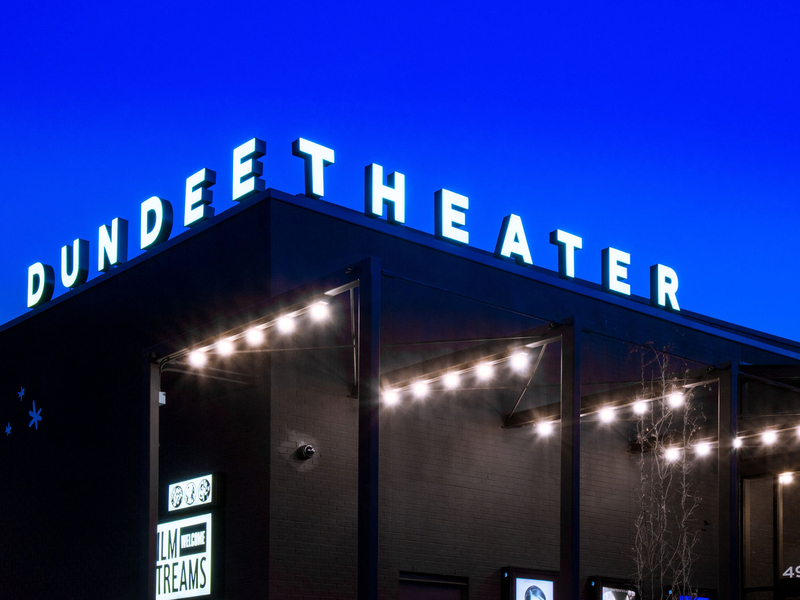 Northside branding cinema film lights signage sky theater typography