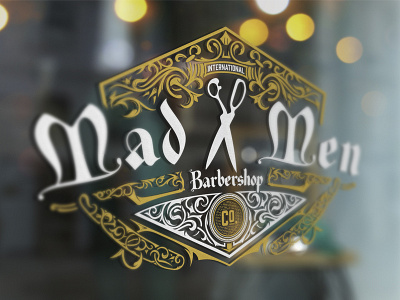 Madmen window display barbershop display floral logo monogram ornaments razor scissors tattoo vintage vynil western window