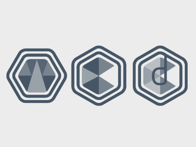 Logo trials for a new startup d grey hexagon triangles