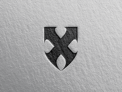 X + Shield logo concept