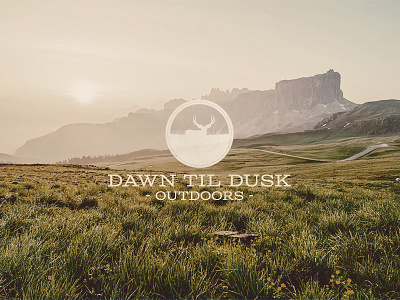 Dawn Til Dusk Outdoors circle deer elk grass hunting logo logo design logo mark logo mock mountains outdoors silhouette