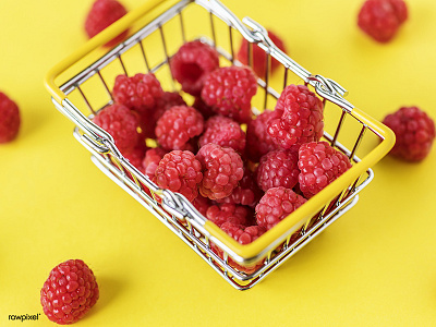 Fresh raspberries in a mini basket basket berry dessert healthy mini organic raspberry yellow