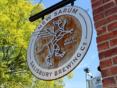 New Sarum Round Sign beer branding brewery griffin gryphon logo salisbury sign wings