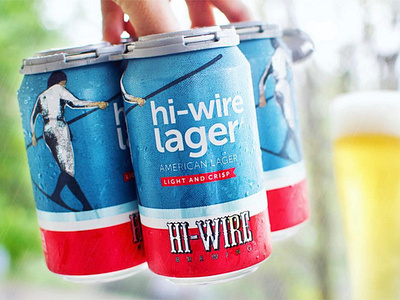 Hi-Wire Lager asheville beer brewery bright can circus label lager packaging photo simple stripes tightrope walker