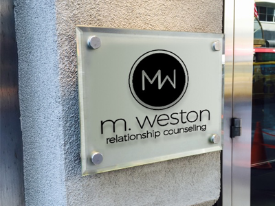 M. Weston business sign