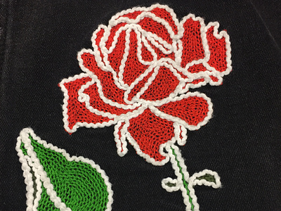 Rose chainstitch embroidery detail