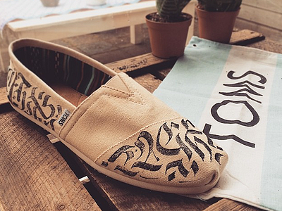 Calligraphy on a shoe branding calligraphy hand ink lettering shoe sketch toms typography