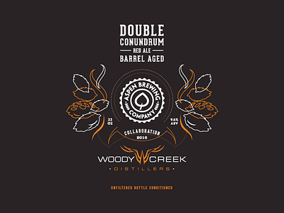 Double Colab aspen brewing company barrel aged beer bomber collaboration distillery label woody creek distillers