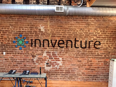 Innventure shortly after we finished the wall installation. branding logo startup