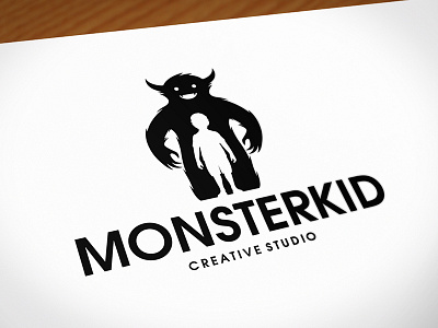 Monster Kid Logo Template character child giant happy human kid logo template mascot monster negative space stock logo titan