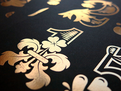 Renaissance Number Closeup black card gold hot foil stamp lettering new year number print