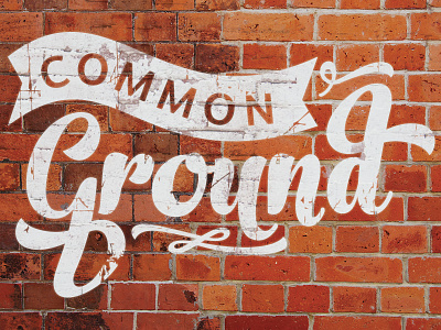 Common Ground brick brown common graffiti ground lines paint red script texture wall worn