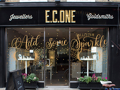 Calligraphy for EC One's Christmas Window calligrapher calligraphy christmas hand lettering handwritten lettering lettering artist merchandising retail design window display