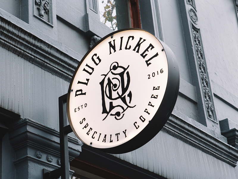Plug nickel signage