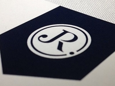 James P. Raymond Jr. blue charity foundation james junior logo raymond serif typography white