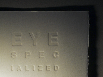 Eye spec blind emboss letterpress