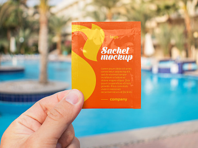 Free Sachet in a Hand Mockup