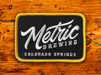 Metric Brewing Logo apparel branding brewery colorado colorado springs embroidered patch graphic design logo logodesign logotype patch typography vector