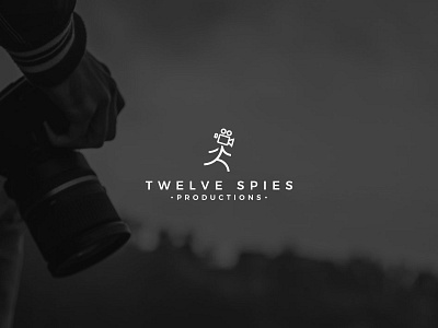 Twelve Spies productions branding camera logo flat log logodesign man logo minimalist logo modern photography logo production logo rental logo running logo