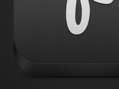 Monogram iOS icon texture closeup