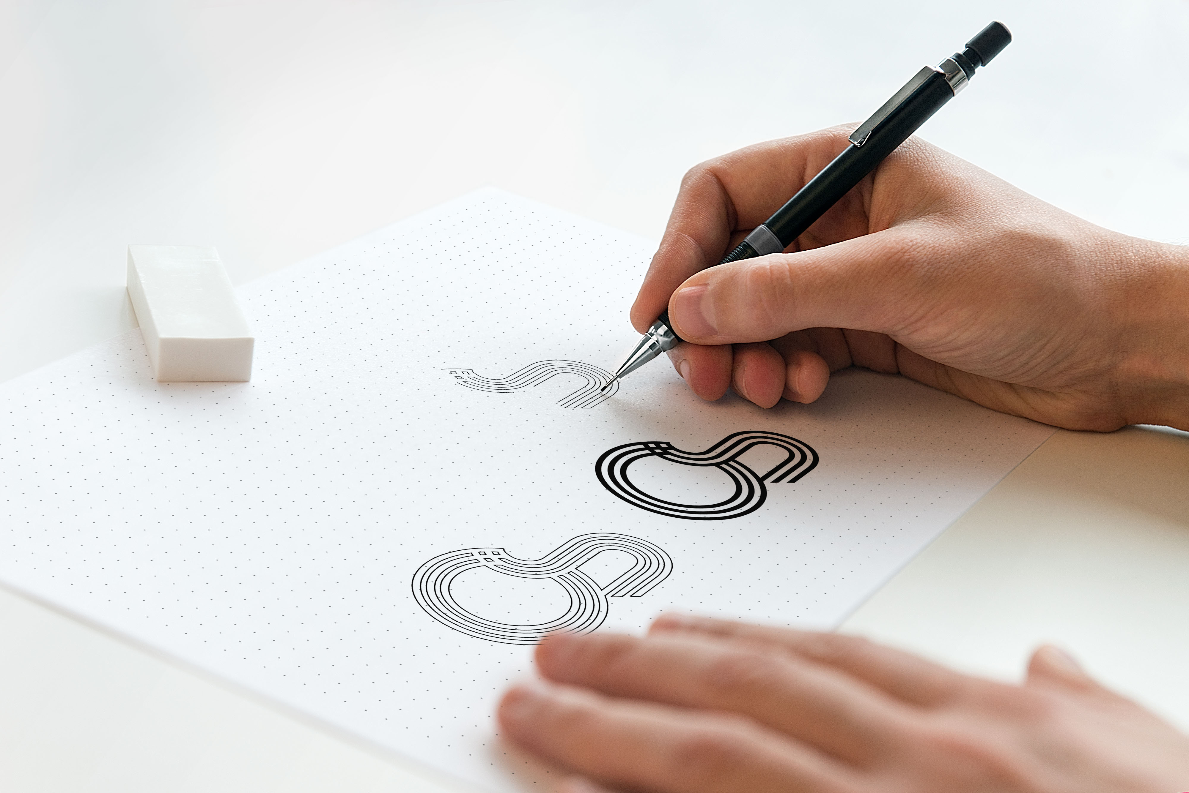 Download Hand Is Drawing Logo Mockup