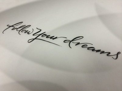 Follow your dreams brush lettering script tattoo