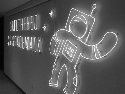 Untethered Space Walk google illustration installation lights neon outer space stars