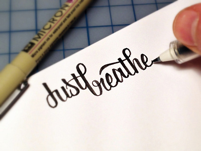Just Breathe Sketch brush hand lettering in a brush lettering script sketch