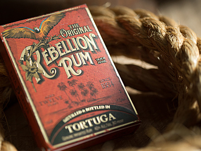 Rebelllion Rum branding design identity illustration lettering liquor logo logotype package packaging type typography