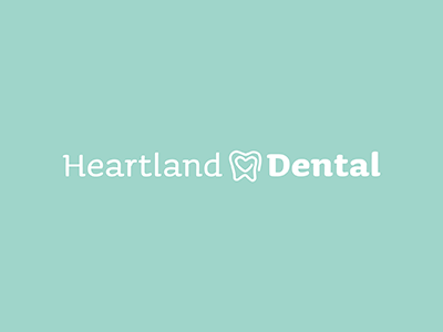 Heartland Dental logo logo