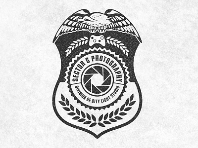 Sector C Badge aperture badge branding eagle identity large talons logo photography police shield wreath xbox