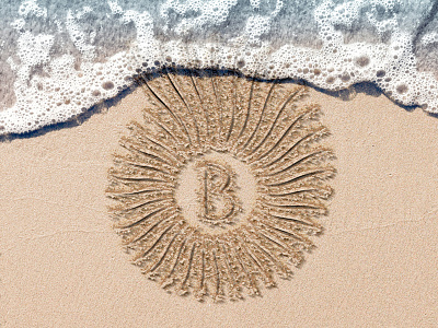 Beachcomber Logo in the Sand