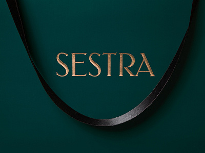 Detail of the Sestra shopping bag austria bag elegant emboss fashion foil gold lettering sestra store