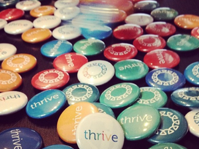 thrive buttons brand buttons collaboration swag
