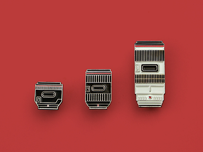 Camera lens enamel pins