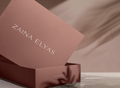 zaina elyas packaging design apparel packaging box design fashion branding identity logo design maroon packaging design