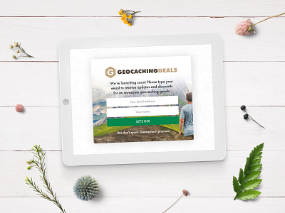 Geocaching Deals: sign in for updates and discounts adventure coming soon email follow form geocaching ipad launch logo plants top view updates website