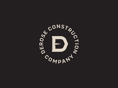 DCCo construction d lettermark lockup logo shovel
