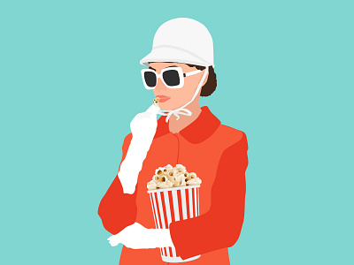Audrey Hepburn eating popcorn