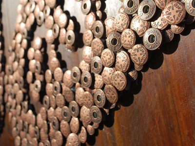 Stay tuned... bronze buttons clover installation logo metal oshkosh wood