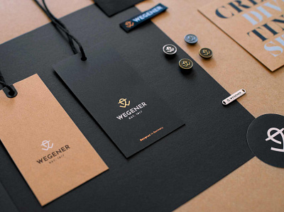 Branding applications for Wegener Headwear brand design brand identity branding chris mimler compliment cards corporate design corporate identity hangtags labels logo design pins print design refinement stickers