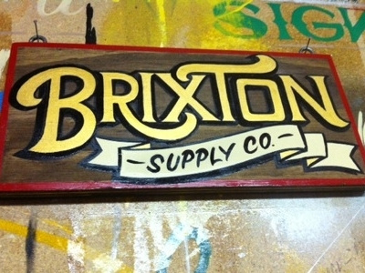 Brixton Supply Co - Enamel on Stained Pine brixton hat co brixton mfg philadelphia sean gallagher sign painter working class creative