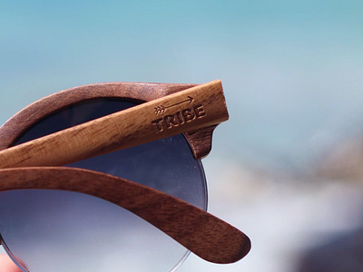 Tribe Sunglasses arrow design font sun sunglasses texture tribe typography wood