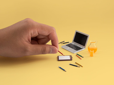 Big Designer, Small Workspace crayons creativity juice laptop miniature photography