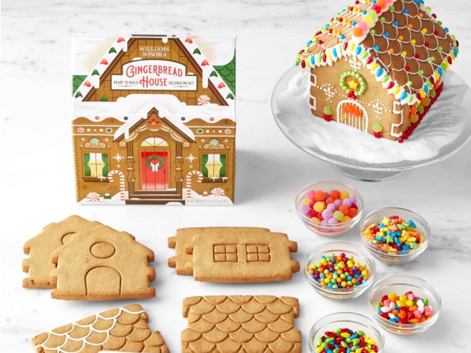 https://cdn.dribbble.com/users/2738/screenshots/16677483/gingerbread-house-kit.jpg