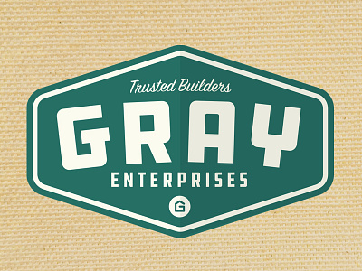 Gray Enterprises badge construction contractor grit hard work logo