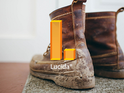 Lucida 3d branding floor letter light logo orange shoe tech technological translucent typography