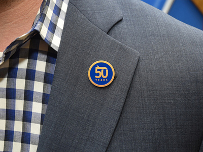 50 Years airplane airport branding enamel pin logo